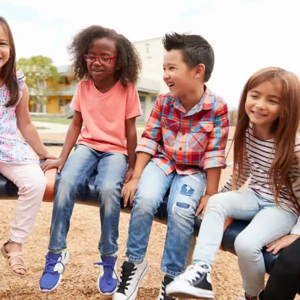 Children participating in a group activity at an autism therapy center
