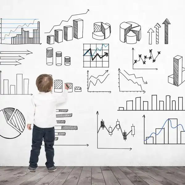 Child looking at business charts and graphs illustrating data analysis and growth trends